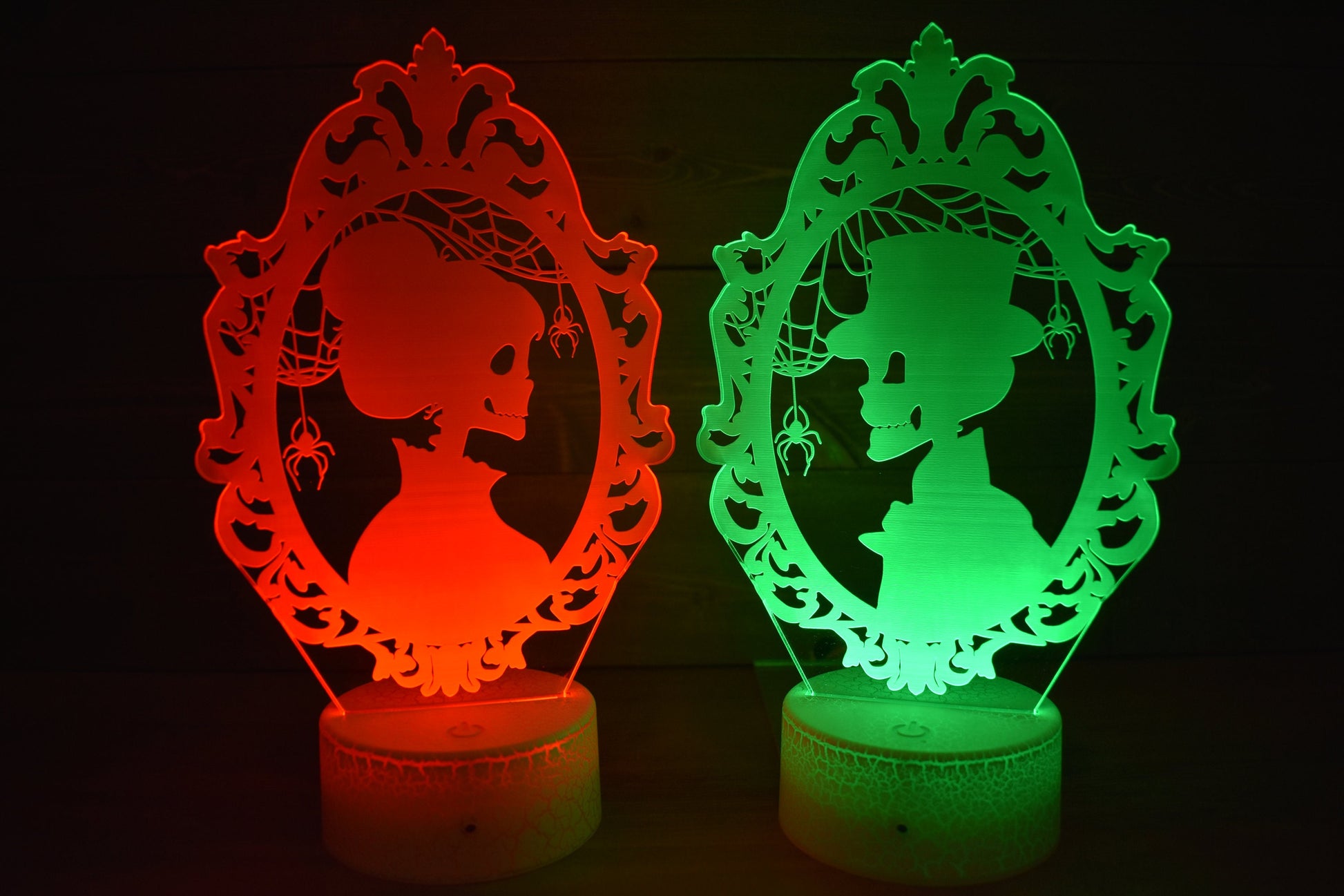 Skeleton Silhouette couple dressed ready for Halloween. LED Lamp with 16 colors and batteries included.