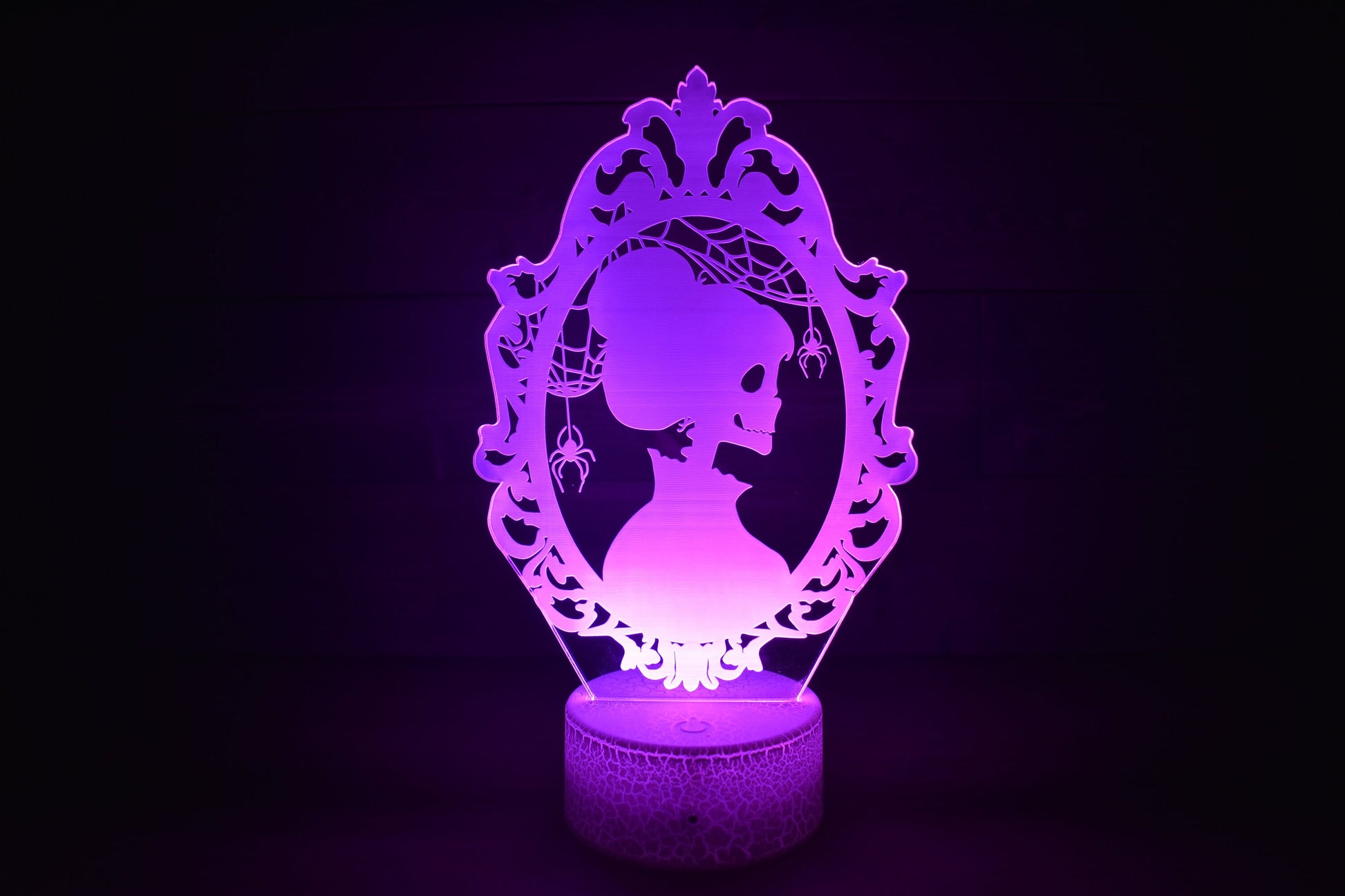 Skeleton Silhouette couple dressed ready for Halloween. LED Lamp with 16 colors and batteries included.
