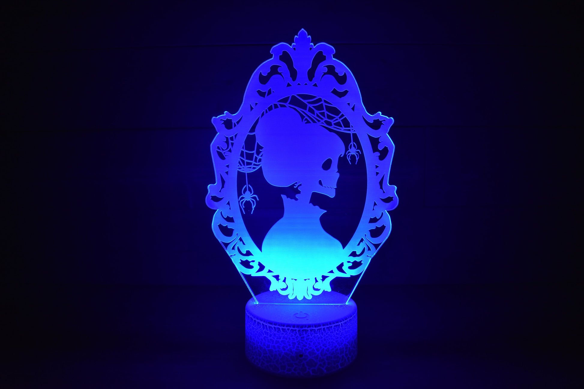 Skeleton Silhouette couple dressed ready for Halloween. LED Lamp with 16 colors and batteries included.