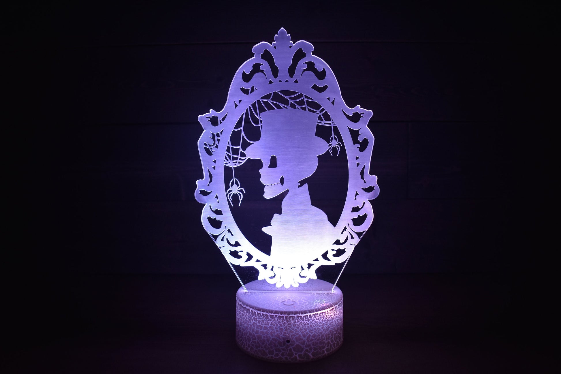 Skeleton Silhouette couple dressed ready for Halloween. LED Lamp with 16 colors and batteries included.