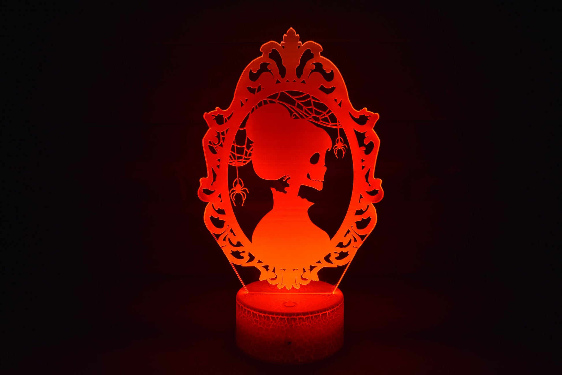 Skeleton Silhouette couple dressed ready for Halloween. LED Lamp with 16 colors and batteries included.