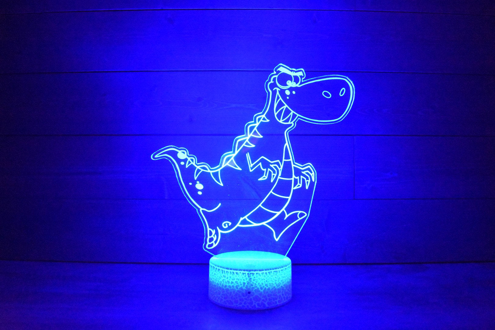 T-Rex Dinosaur Lamp perfect for dino fans, young and old fans . LED Lamp with 16 colors and 4 options.