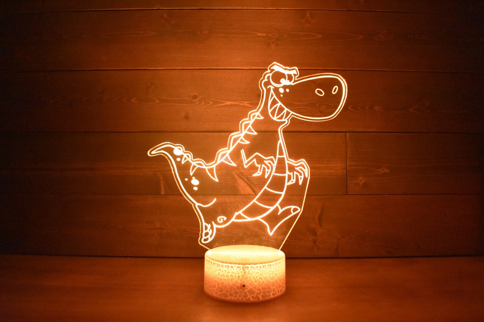 T-Rex Dinosaur Lamp perfect for dino fans, young and old fans . LED Lamp with 16 colors and 4 options.