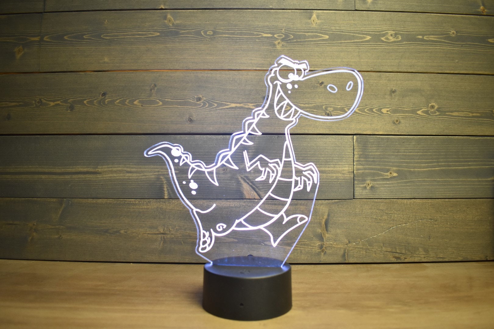 T-Rex Dinosaur Lamp perfect for dino fans, young and old fans . LED Lamp with 16 colors and 4 options.